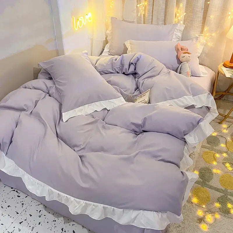 Lavender duvet cover set with delicate white ruffled trim for bedroom bedding and quilted light blue and white cover set