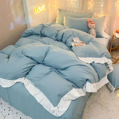 Light blue quilted duvet cover set with white ruffled trim elegant cover set for stylish bedroom bedding