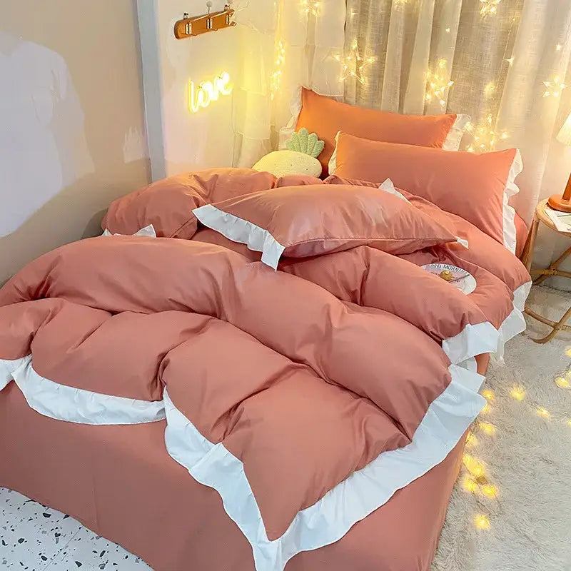 Pink ruffled comforter duvet cover set with white trim designed for bedroom bedding comfort and style