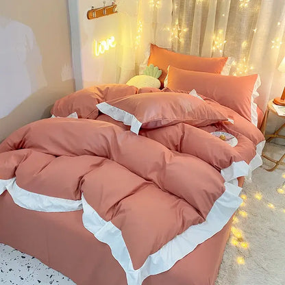Pink ruffled comforter duvet cover set with white trim designed for bedroom bedding comfort and style