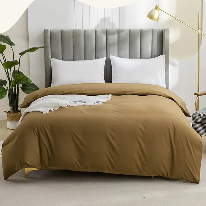 Taupe-colored quilted duvet cover set with smooth texture and subtle sheen for soft bedroom bedding cover set