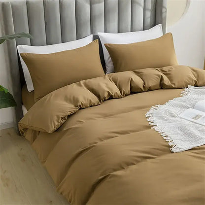 Warm caramel-colored quilted duvet cover set with soft plush fabric and matching pillowcases for bedroom bedding