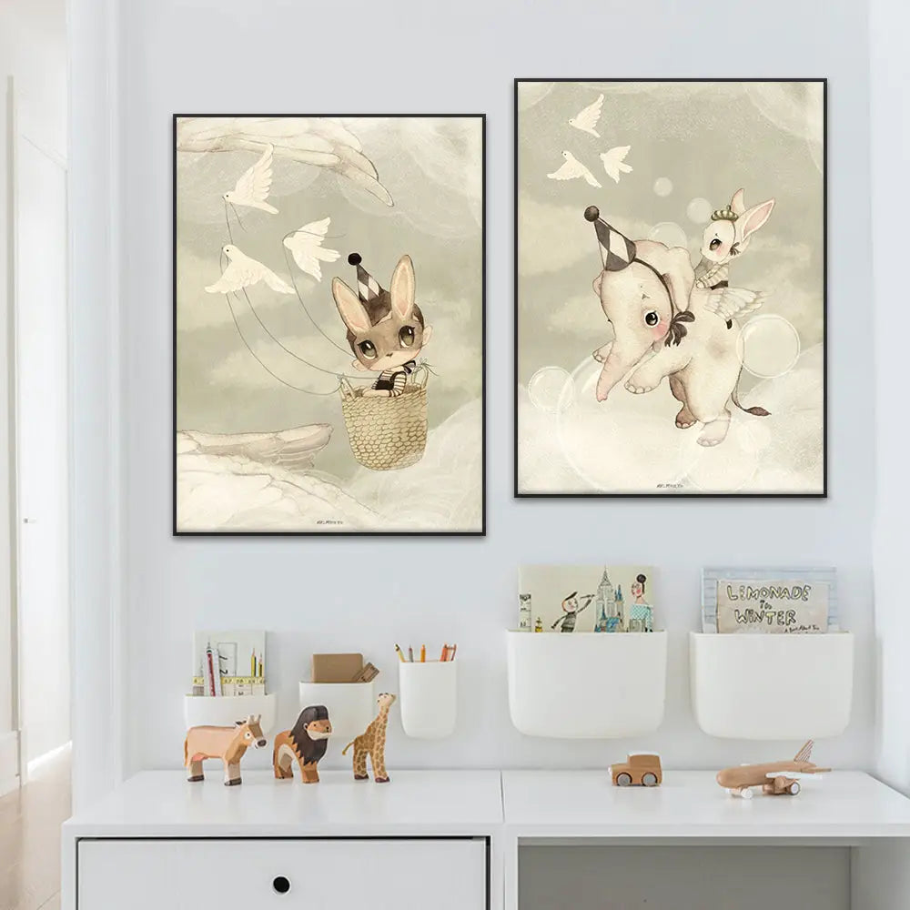 Two framed decorbites™ beige rabbit girl canvas prints featuring pastel rabbit girl and elephant illustrations for kidsató room