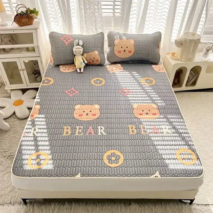Gray quilted cooling mattress pad with cartoon print bear faces and floral patterns from decorbites mattress set