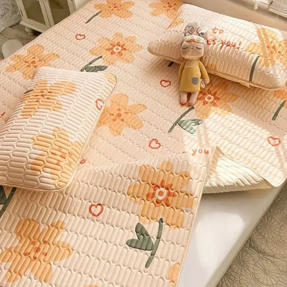 Cream-colored quilted bed pad with embroidered orange flowers and red hearts for decorbites cartoon print mattress set