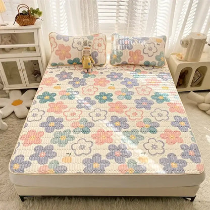 Pastel floral quilted bed pad with embroidered blossoms in pink lavender and mint green on cream for mattress set decorbites cartoon print