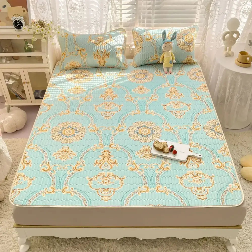 Light blue quilted mattress set with gold ornate damask pattern and matching pillowcases decorbites cartoon print