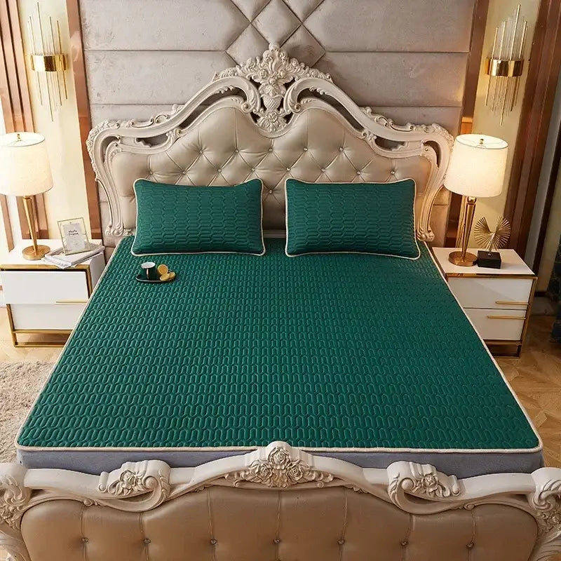 Emerald green quilted mattress pad with subtle texture and stitched edges in decorbites cartoon print mattress set