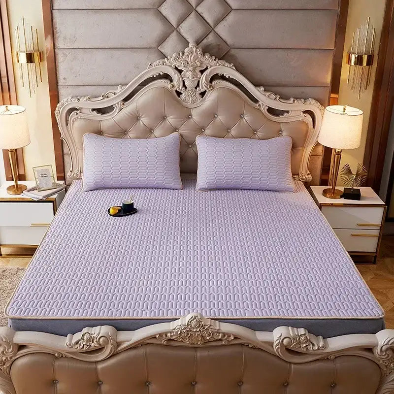 Lavender quilted mattress pad with subtle texture and plush feel in rainbow striped decorbites cartoon print mattress set