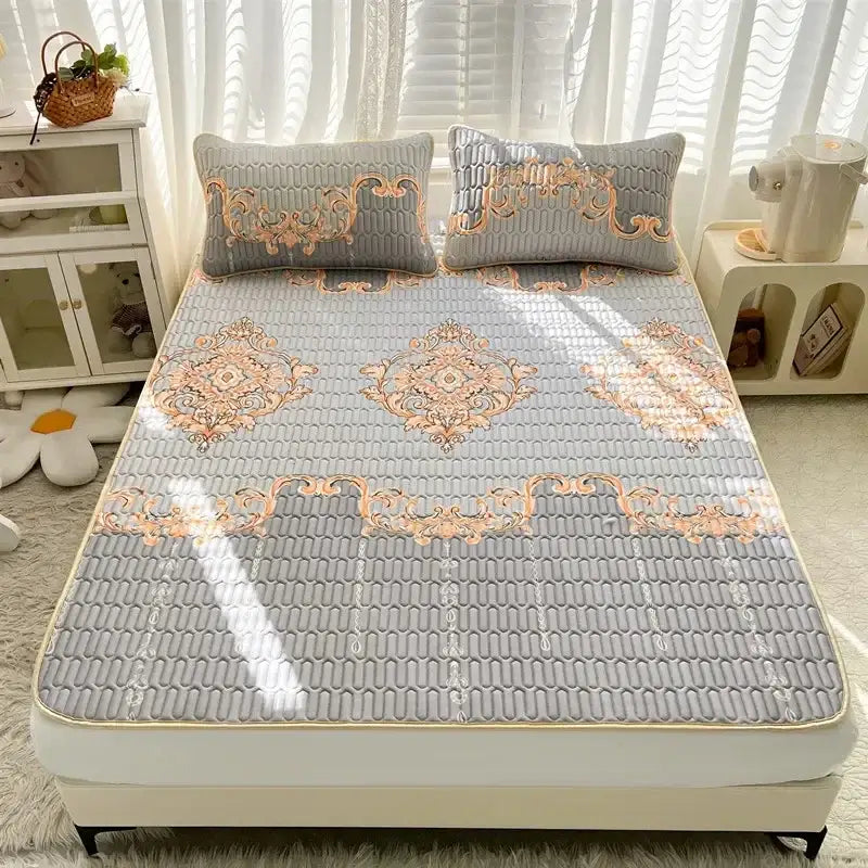 Gray quilted bed pad with ornate peach embroidery and textured surface for rainbow striped cartoon print mattress set decorbites cartoon print