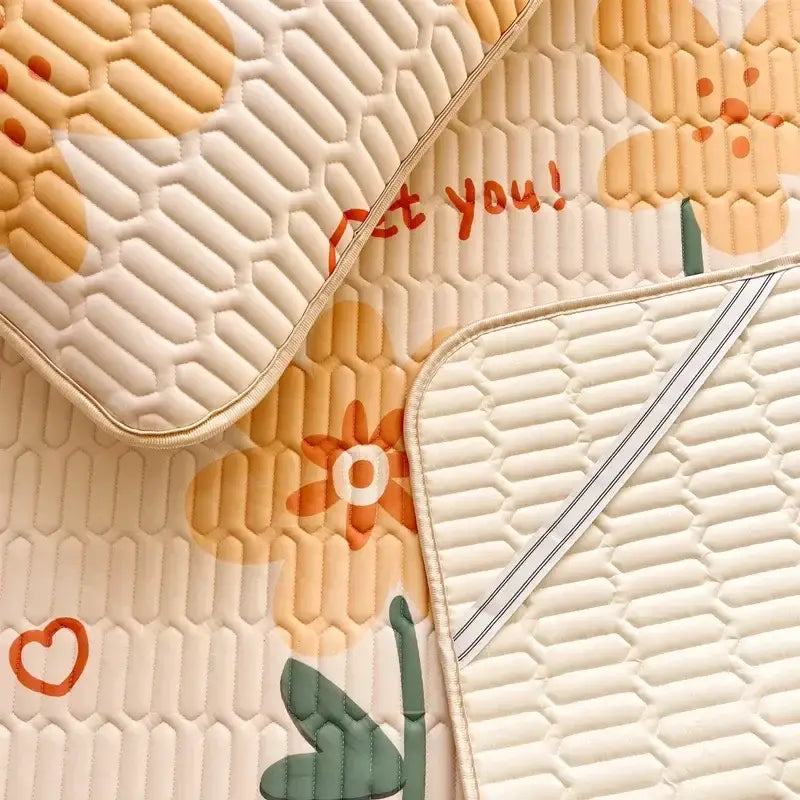 Cream-colored quilted car seat cover with honeycomb texture and orange green floral print from decorbites cartoon print mattress set