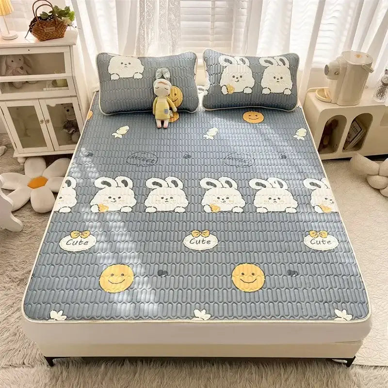 Gray quilted cooling mattress pad with cute white bunny and yellow smiley faces in decorbites cartoon print mattress set