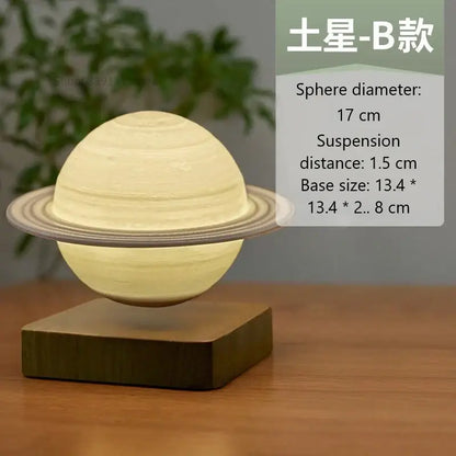 A cream-colored saturn-themed decorbites levitating moon lamp with detailed rings and wooden base for bedroom night light
