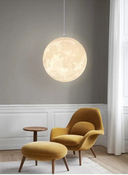 Realistic white and yellow moon pendant light featuring textured lunar surface in high polymer for bedroom use
