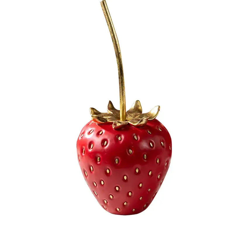 Vibrant red ceramic strawberry ornament with gold leaf accents and golden stem for home decor by decorbites gold strawberry