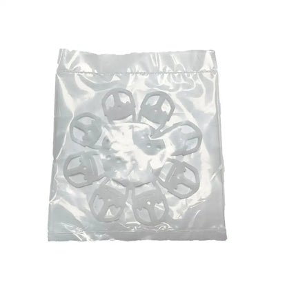 White plastic clip-style fasteners in clear bag for red and black espresso coffee machine brush cleaning tool