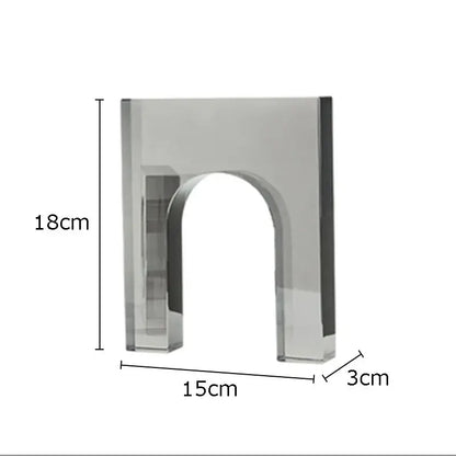 A sleek red and blue geometric crystal arch glass sculpture with polished silver finish for living room decor