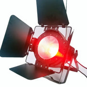 Red led par cob stage light with adjustable black barn doors and metal frame for living room use