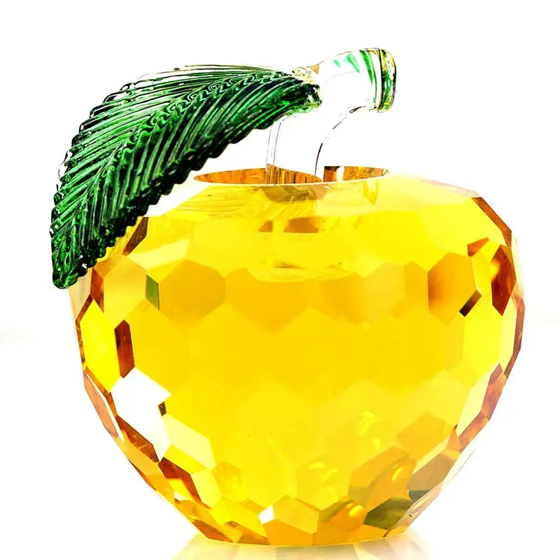 A faceted crystal yellow apple ornament with green leaf and stem from decorbites 3d crystal for office desktop decor