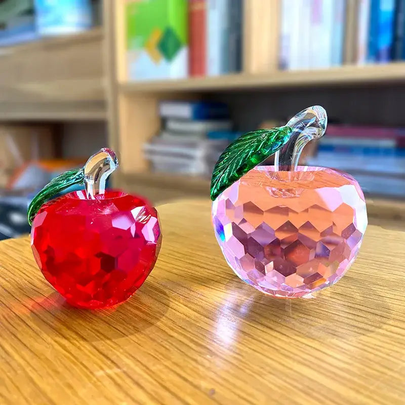 Vibrant red and pink decorbites 3d crystal yellow apple figurines with faceted surfaces and green leaf stems for office decor