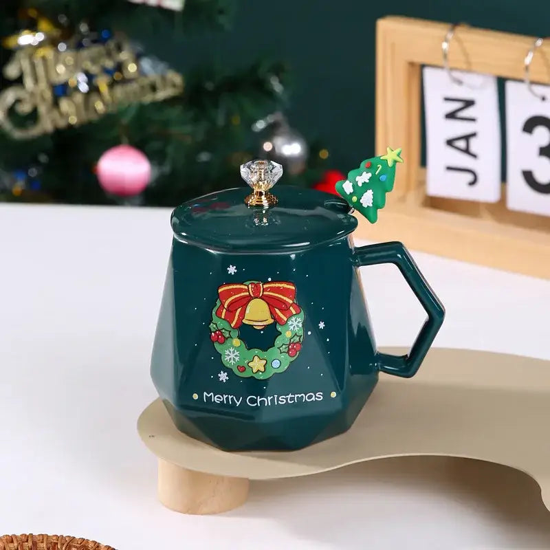 Dark green ceramic mug with festive wreath design crystal knob lid and tree charm handle from christmas ceramic mug set