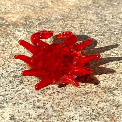 Vibrant red speckled decorbites crab glass figurine with glossy translucent finish and detailed limbs for living room art decor