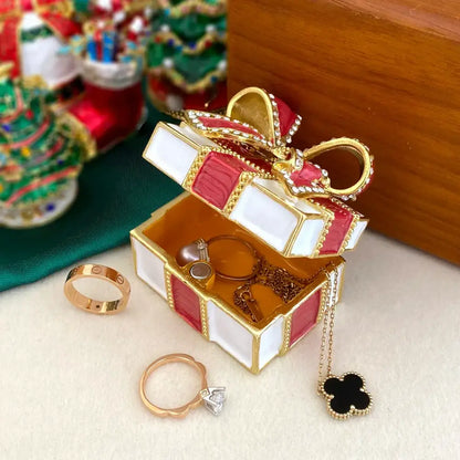 Red and white enamel jewelry trinket box with gold-trimmed rhinestone bow for bedroom gift storage