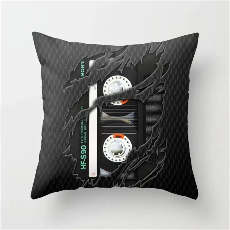 Black throw pillow cushion cover featuring a detailed sony hf-s90 cassette tape graphic on a textured carbon fiber background