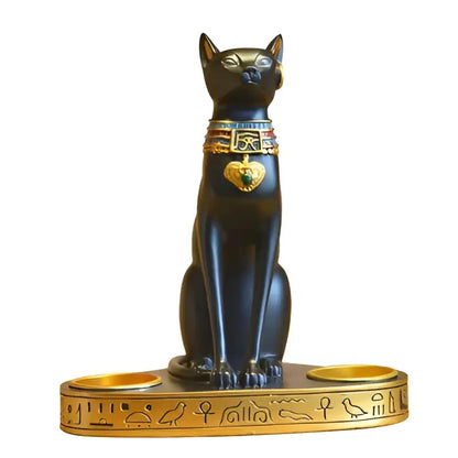 Retro black and gold cat goddess candle holder figurine with hieroglyphics sitting on matching base for living room decor