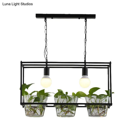 Black metal rectangle island ceiling light with three clear glass planters and two exposed bulb fixtures for dining room