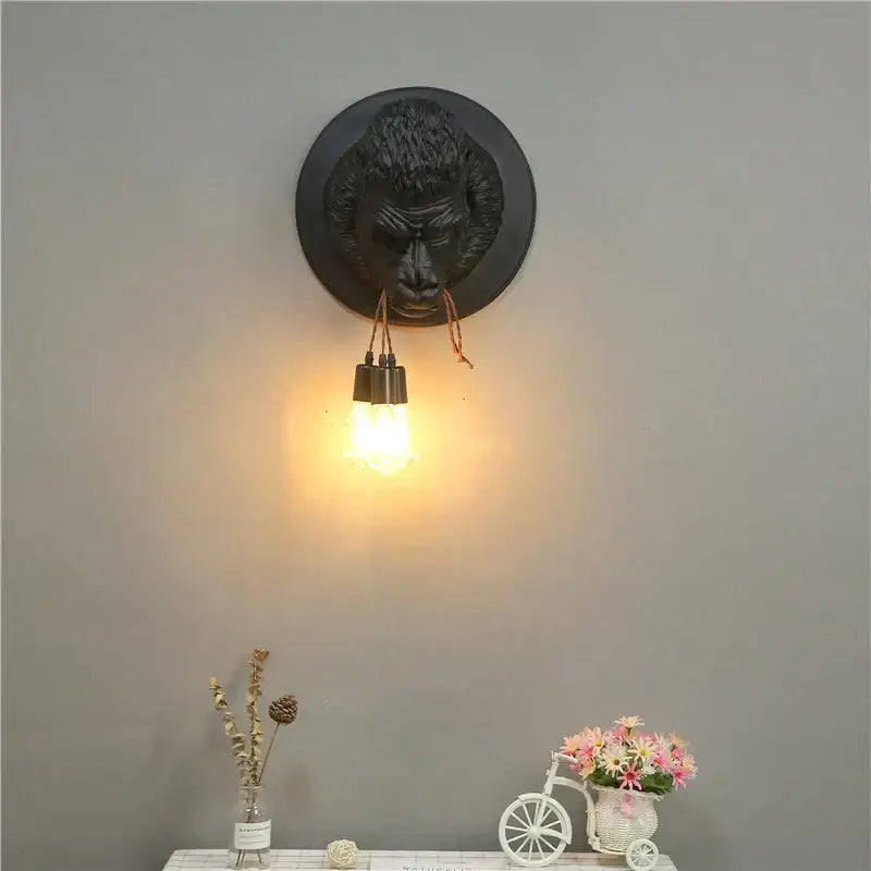 Black gorilla resin wall sconce with three hanging edison bulbs for retro bedroom decorbites gorilla resin lamp