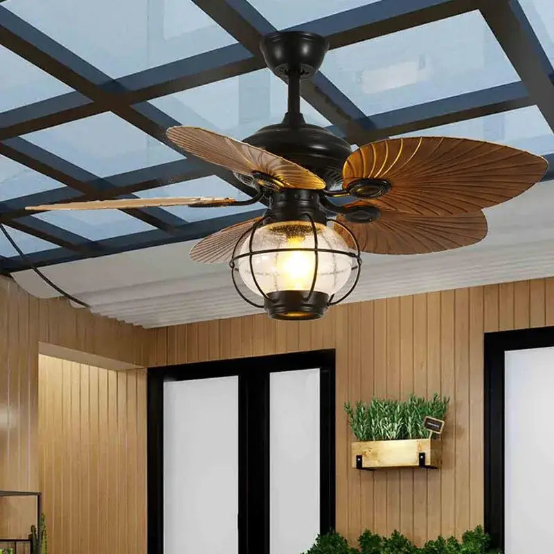 Retro black iron fan light with wooden blades and glass globe light fixture with remote control for living room use