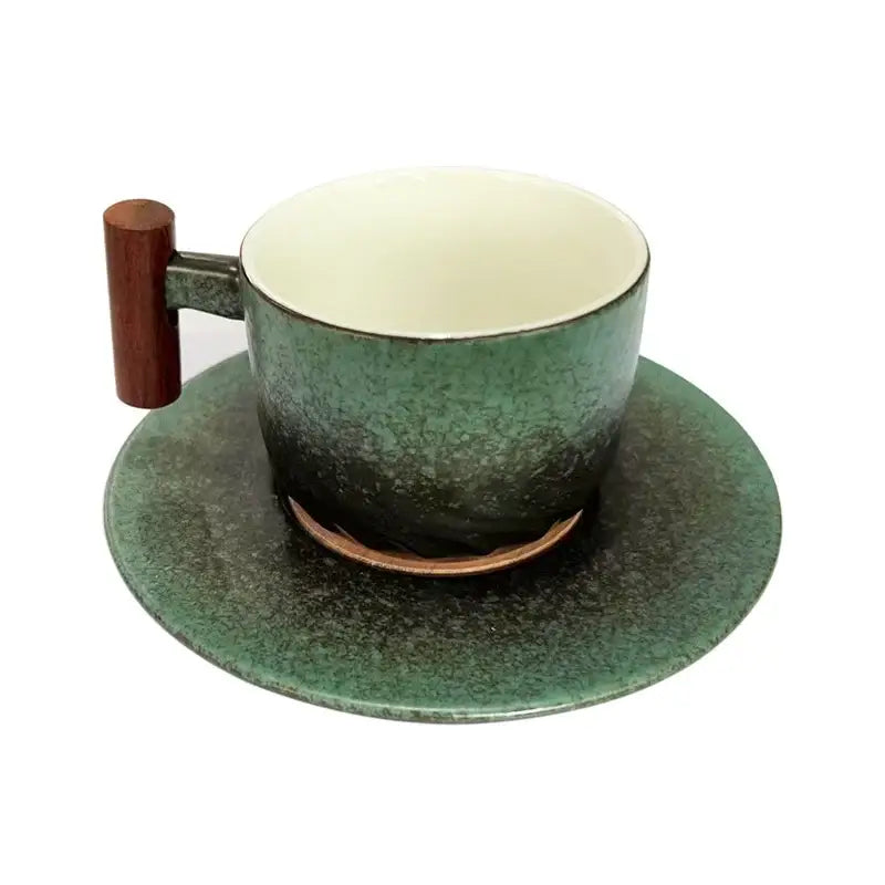Green speckled ceramic coffee cup with wooden handle and matching saucer from decorbites 130ml blue kitchen set