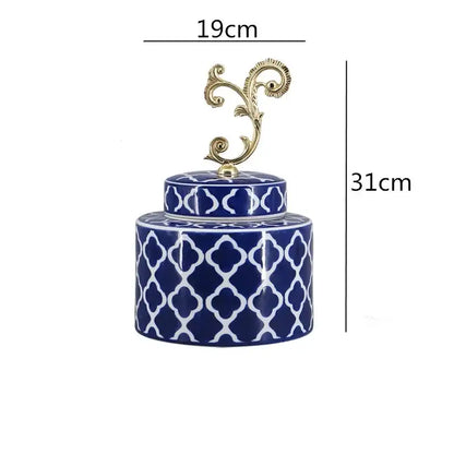 Deep blue porcelain covered vase jar with white quatrefoil pattern and gold handle for living room storage