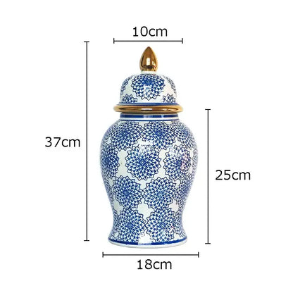 Tall elegant retro blue and white porcelain ginger jar with gold toned lid and finial decorbites blue porcelain ginger jar