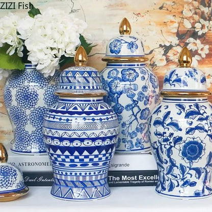 Retro blue and white porcelain ginger jar with gold tipped lids featuring intricate geometric and floral patterns decorbites blue