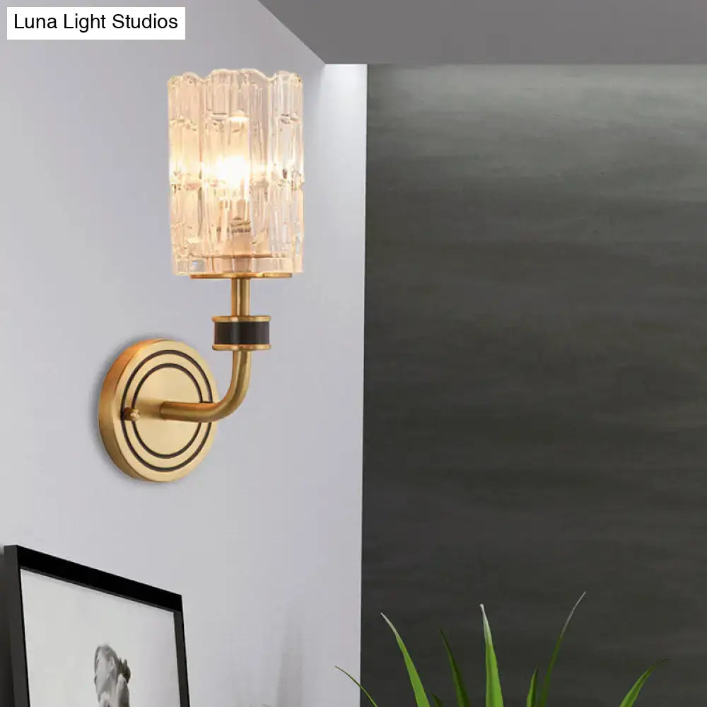 Gold-toned retro brass wall light with faceted translucent glass shade compatible with e12 e14 bulb base