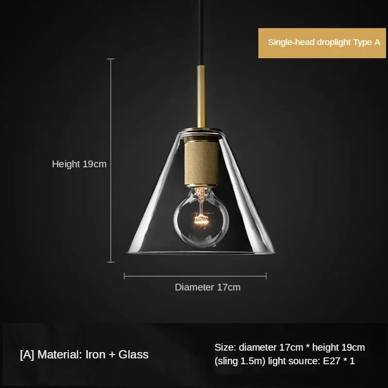 A sleek retro brass and glass pendant light with clear conical shade and iron frame ideal for dining room decorbites gold led