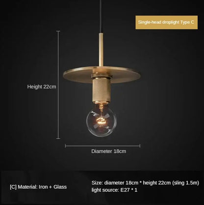 Retro brass and glass led pendant light with a circular iron base and black cord ideal for dining room decorbites gold led