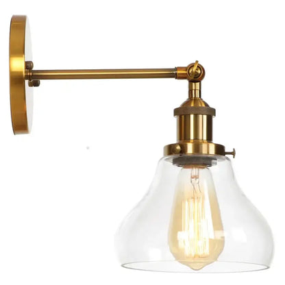 Retro brass and glass wall sconce with clear shade and exposed filament bulb for decorbites gold led wall lighting
