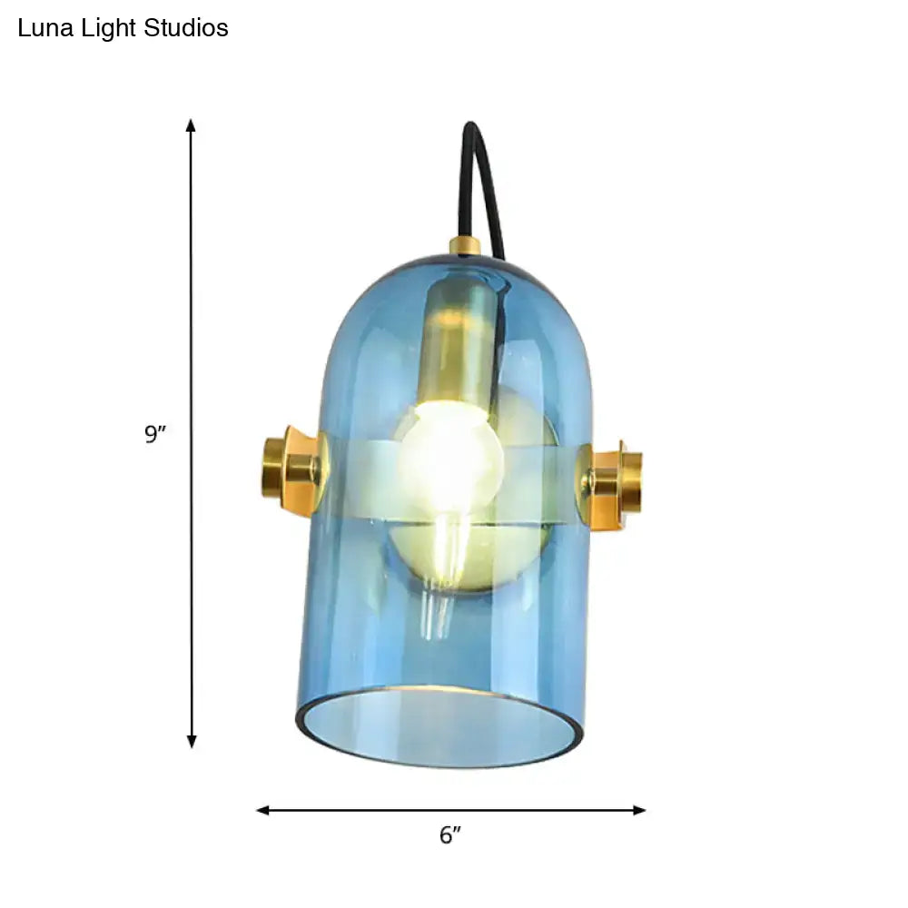 Retro brass cloche sconce light with blue glass smoke gray pendant and gold-toned hardware for bedroom use