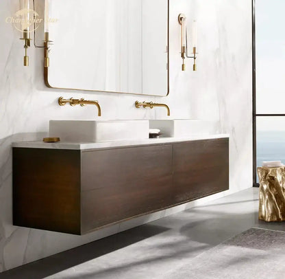 Modern floating bathroom vanity with dark wood and white marble countertop paired with retro brass glass double sconce wall light