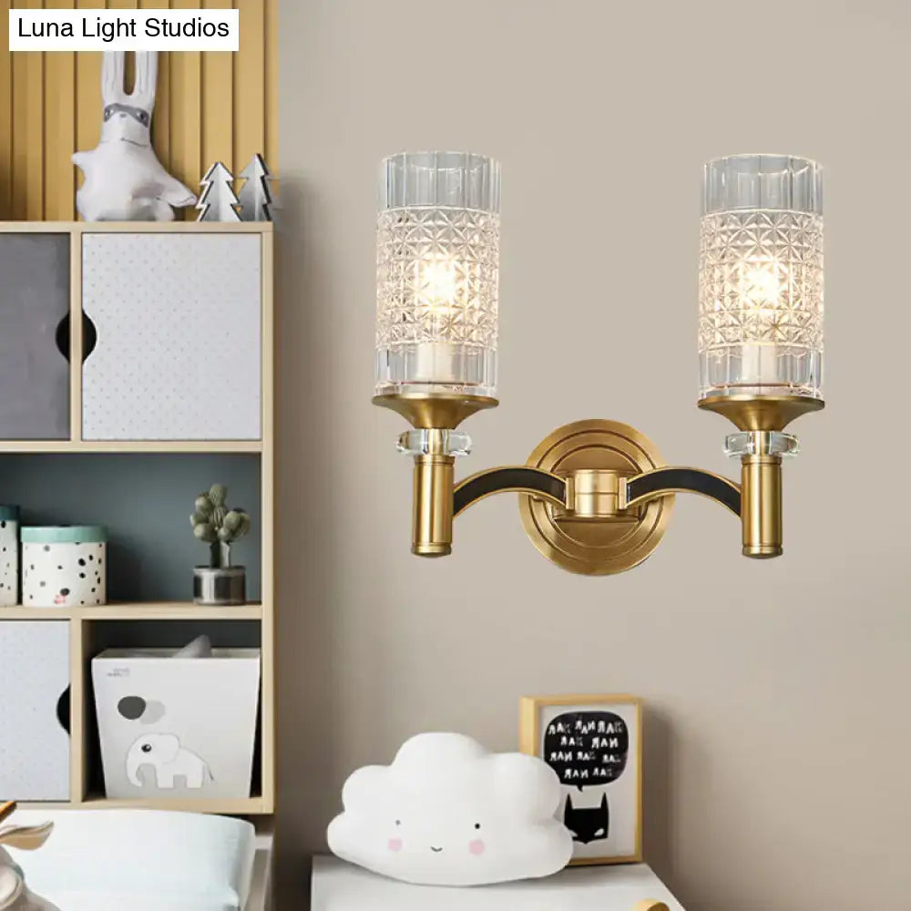 Retro brass gridded crystal wall light with brass finish and two faceted glass shades for living room wall light