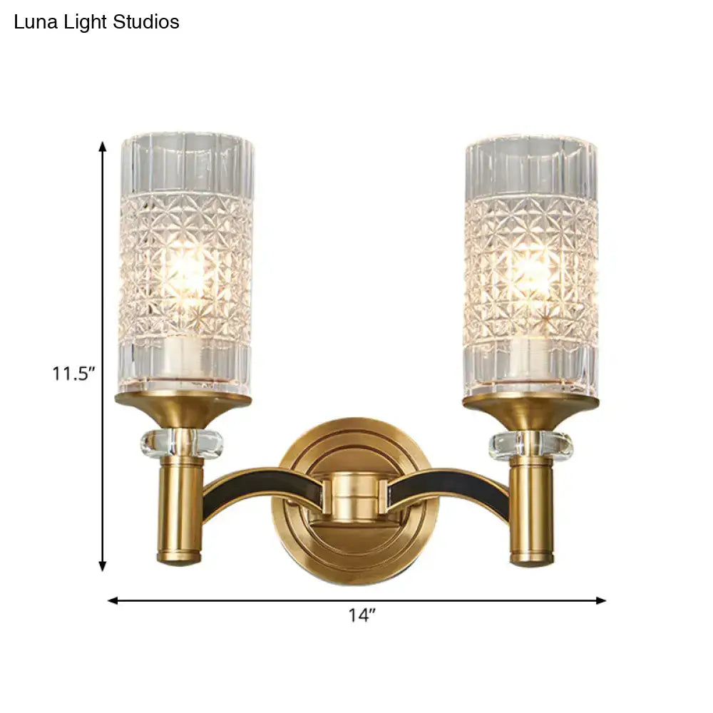 Gold-toned retro brass wall light with gridded crystal shades and black accent arms for living room use