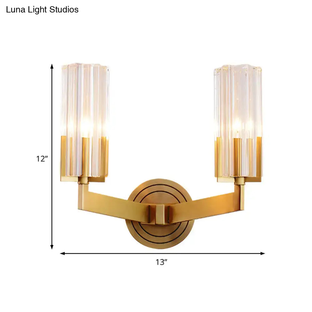 Gold-toned retro brass wall lamp with two vertical ribbed glass shades 12 inches wide for living room sconce lighting