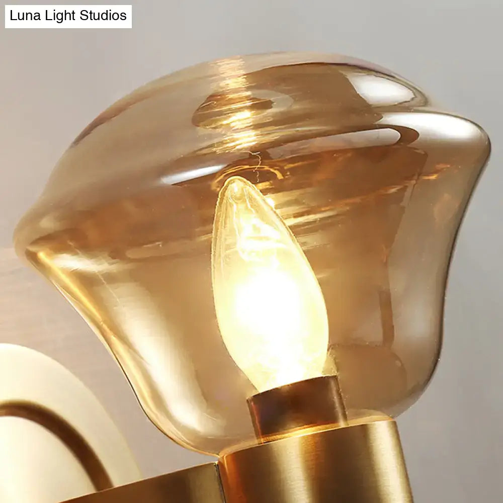 Retro brass smoke gray and amber glass wall light fixture with warm amber glass lampshade and brass base for bedroom sconce