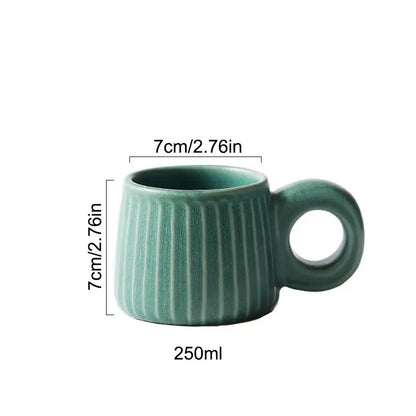 Teal ceramic mug with vertical ridges and circular handle 7cm tall 250ml capacity decorbites handmade nordic ceramic mug