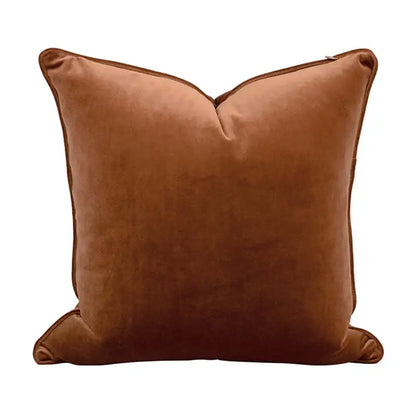 A plush caramel brown velvet pillow cover with neatly stitched edges for decorbites circus retro living room decor