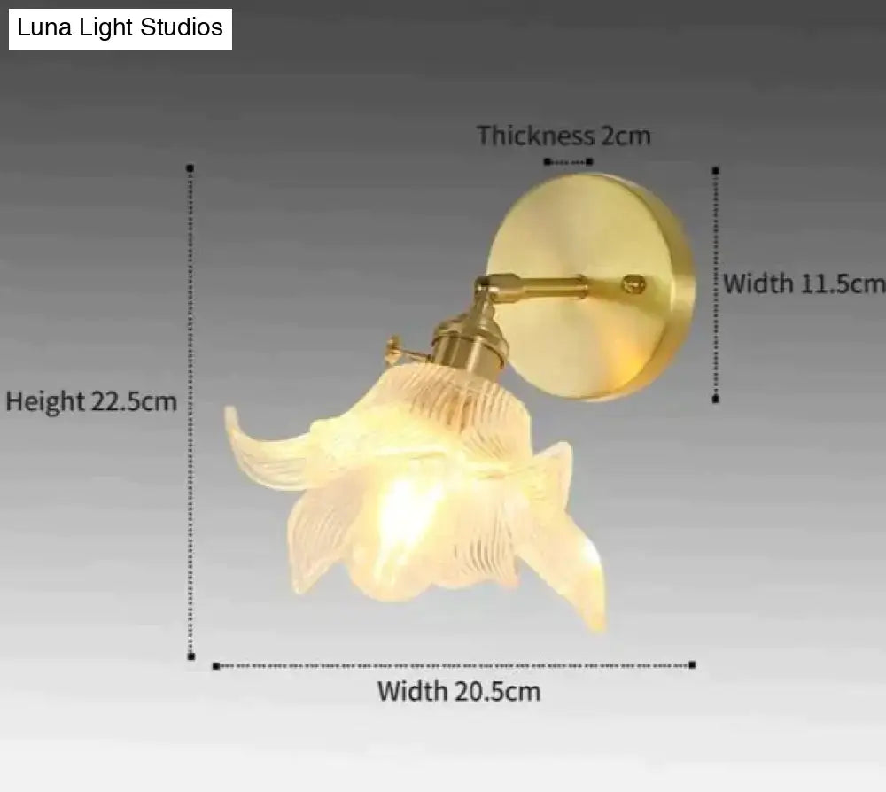 Gold-toned retro copper flower brass wall sconce with frosted translucent fluted glass shade for bedroom lighting