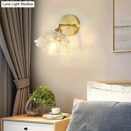 Retro copper flower brass wall sconce with gold-toned finish and delicate translucent fluted glass shade with leaf pattern